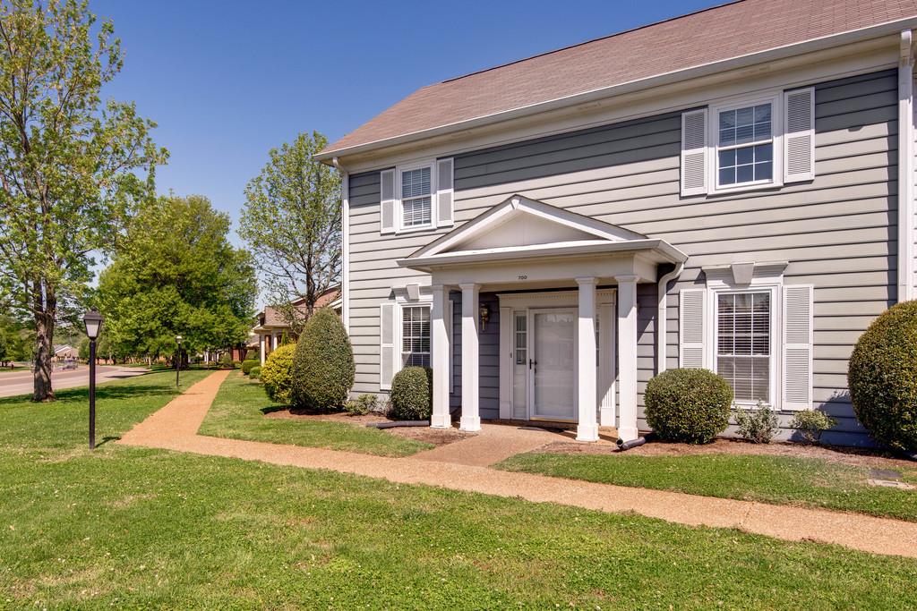 700 General George Patton Road Nashville, TN 37221 - Photo 1 of 21 a front view of a house with a yard