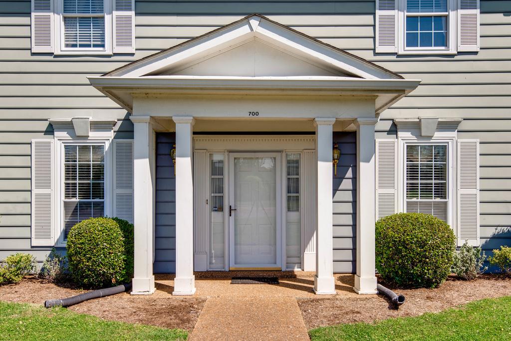 700 General George Patton Road Nashville, TN 37221 - Photo 2 of 21 a front view of a house with garden