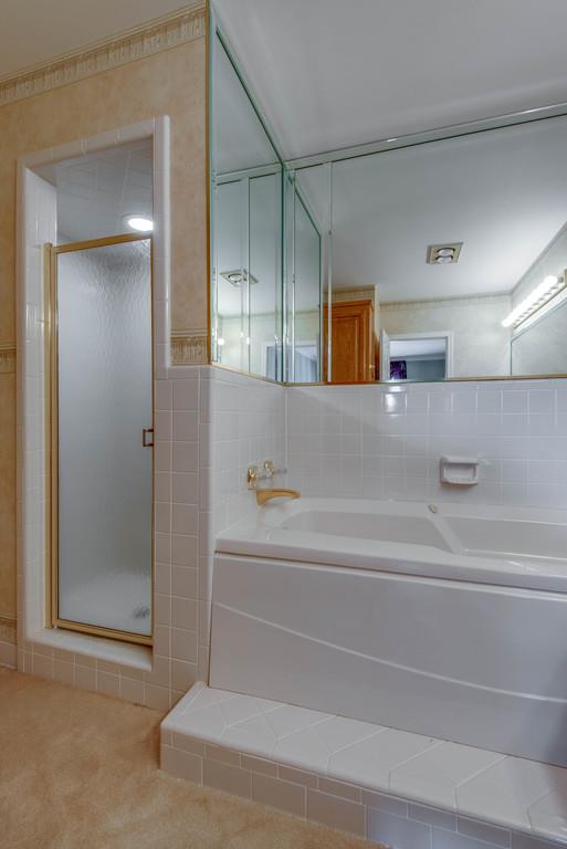 700 General George Patton Road Nashville, TN 37221 - Photo 16 of 21 a bathroom with a bathtub and shower