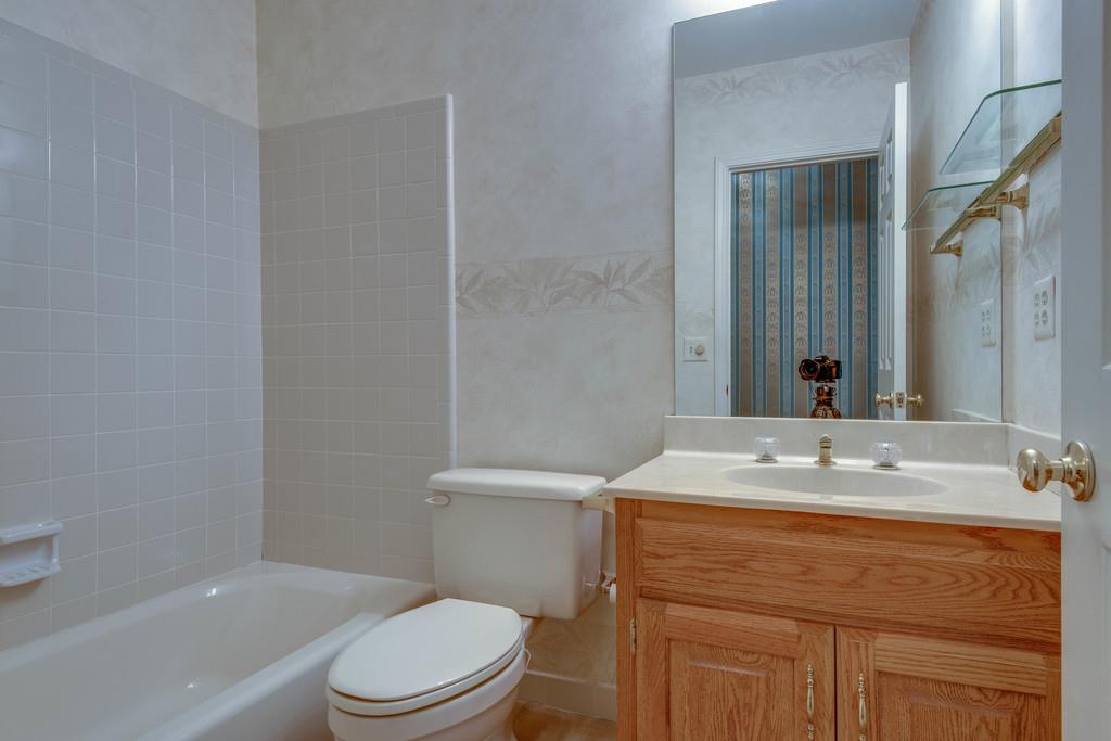 700 General George Patton Road Nashville, TN 37221 - Photo 19 of 21 a bathroom with a sink toilet vanity and shower