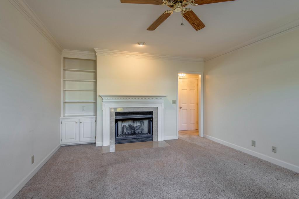 700 General George Patton Road Nashville, TN 37221 - Photo 9 of 21 a view of an empty room with a fireplace and a window