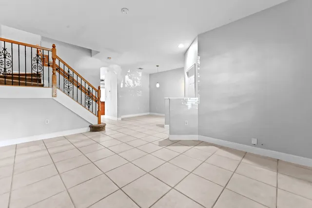 a view of an entryway with stairs