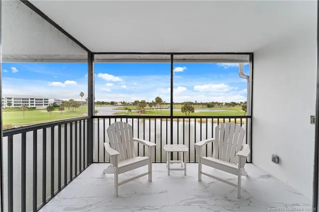 a view of a chair in a balcony