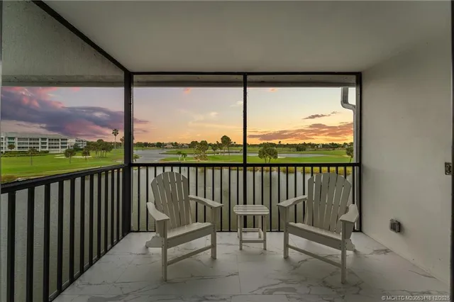 a view of porch with a furniture