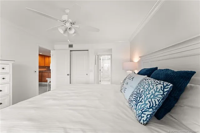 a bathroom with a shower and a glass door