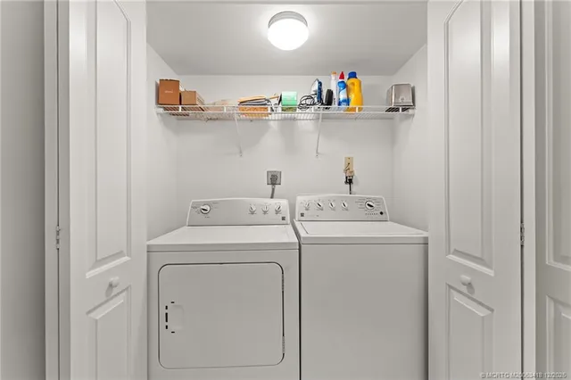 a view of a city from a corridor