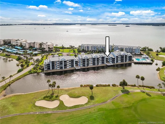 a sign on the side of a street