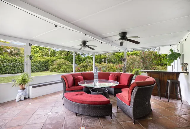 a outdoor space with patio the couches and a dining table with garden view