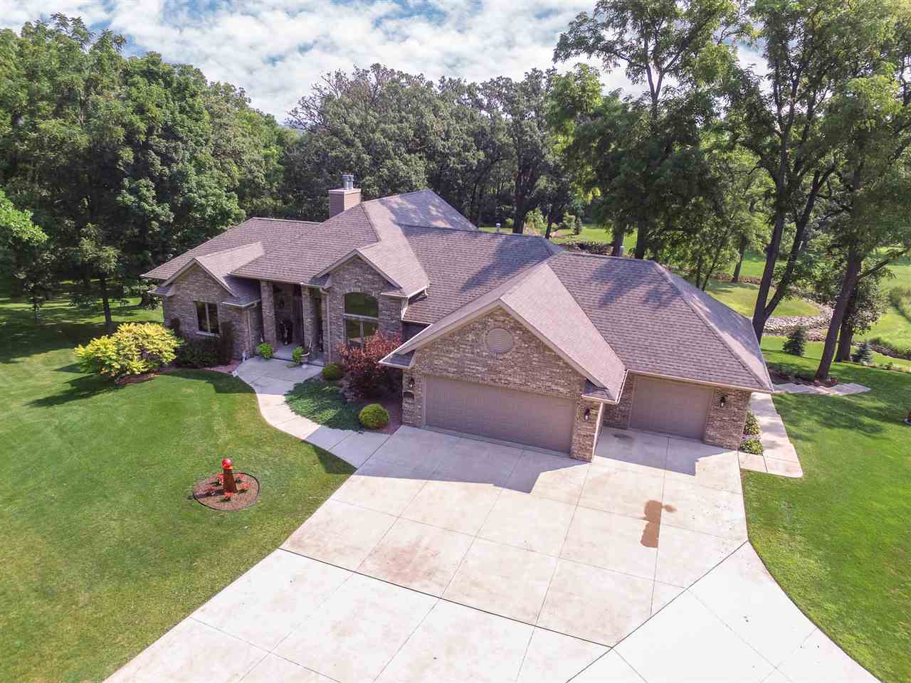 12019 Patterson Road Durand, IL 61024 - Photo 1 of 25 a view of a house with a yard