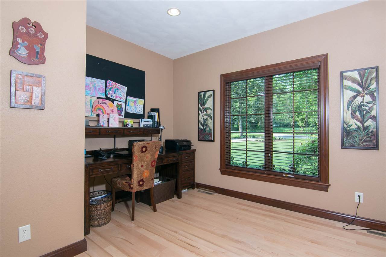 12019 Patterson Road Durand, IL 61024 - Photo 19 of 25 a view of a workspace with furniture and a window