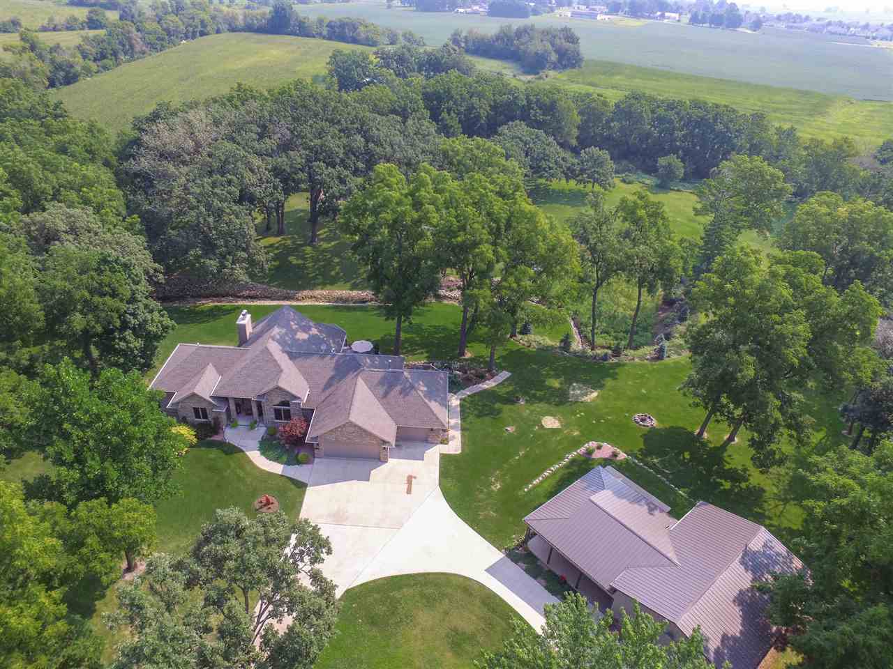 12019 Patterson Road Durand, IL 61024 - Photo 2 of 25 an aerial view of a house with a garden