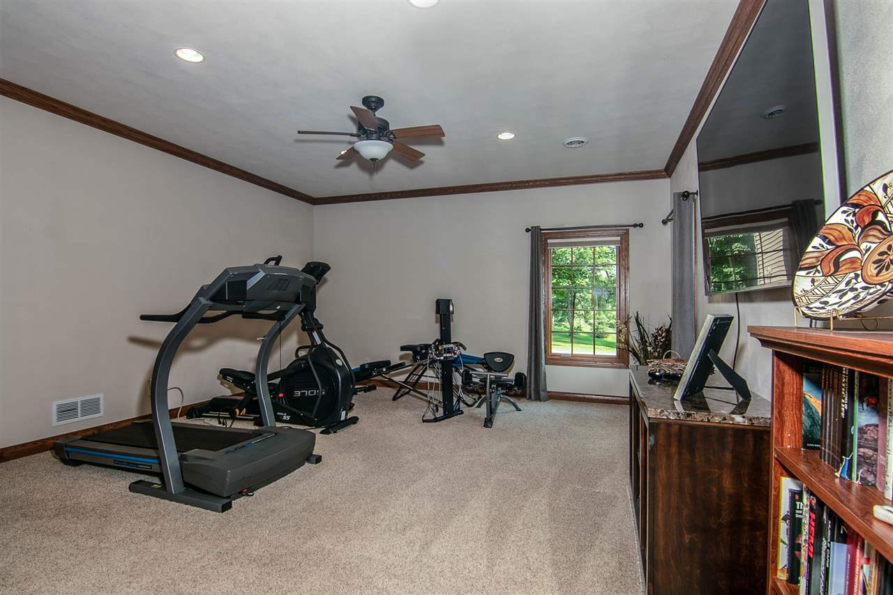 12019 Patterson Road Durand, IL 61024 - Photo 22 of 25 a view of a room with gym equipment