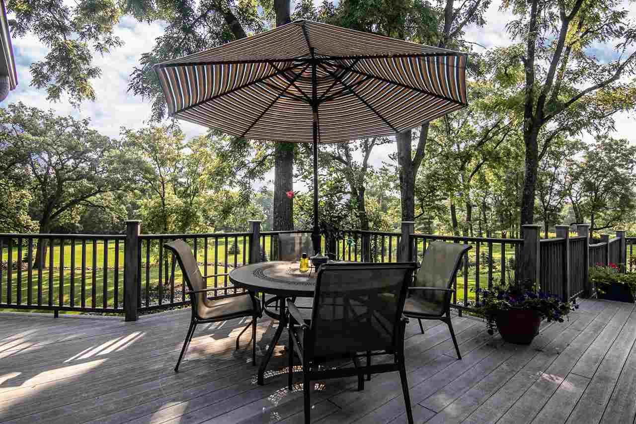 12019 Patterson Road Durand, IL 61024 - Photo 4 of 25 a view of balcony with furniture and wooden floor