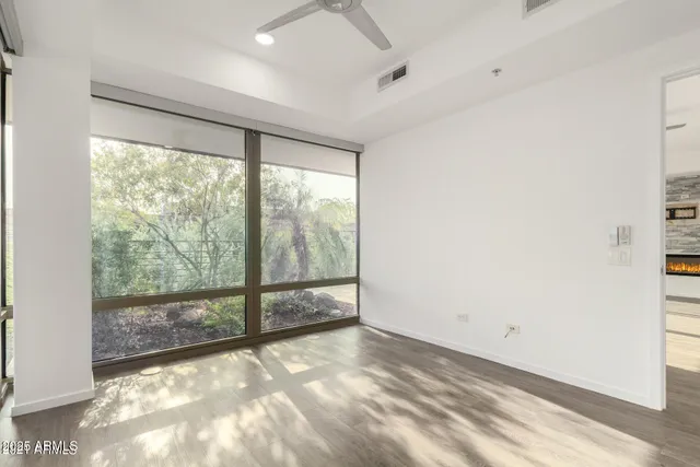 a view of a room with large windows