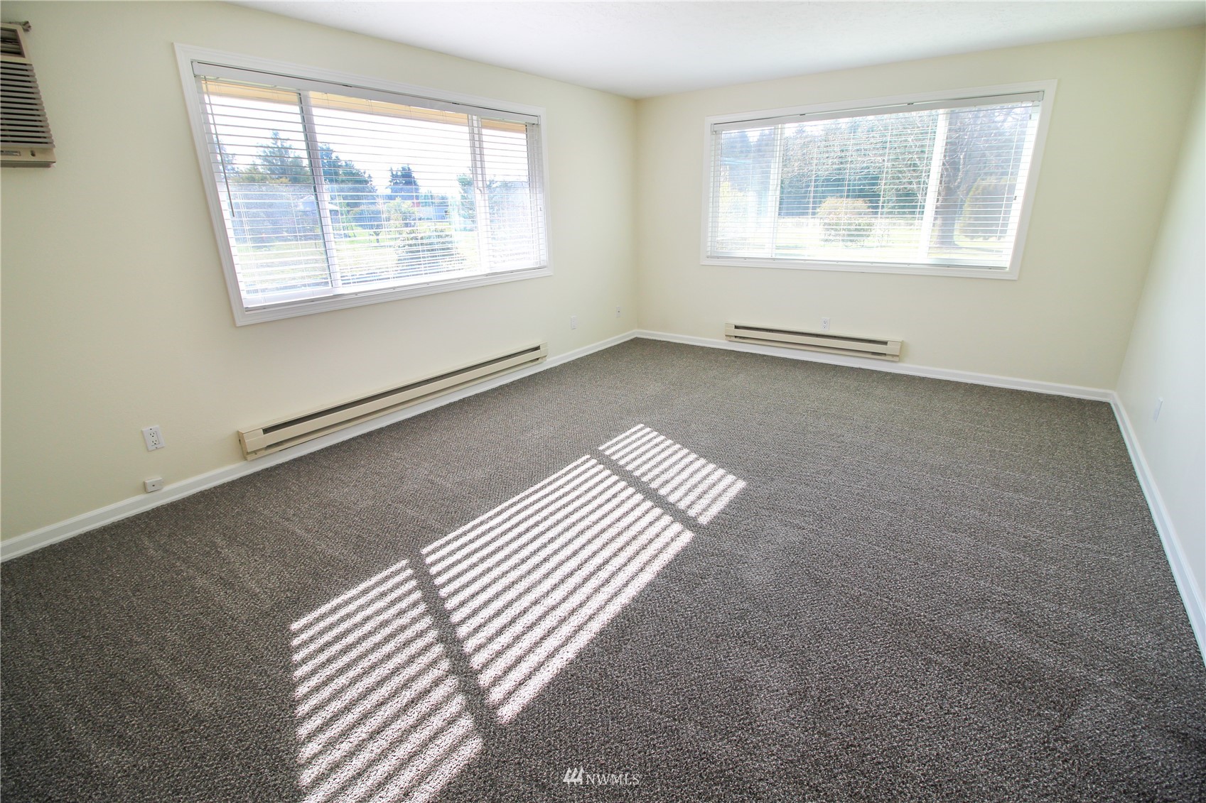18245 Cinnamon Lane Southwest Rochester, WA 98579 - Photo 4 of 22 an empty room with windows