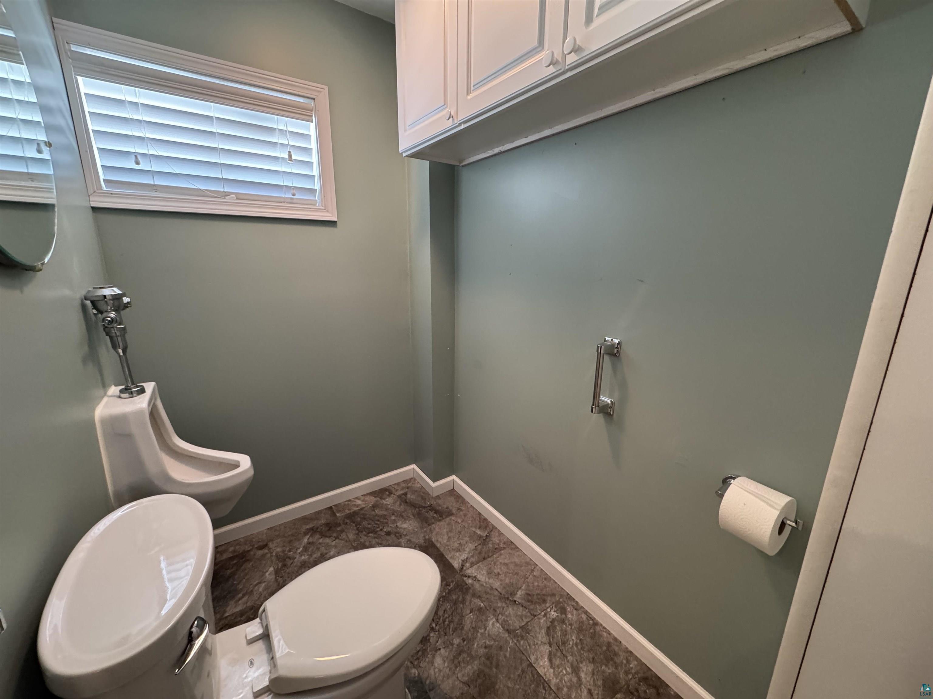 406 4th Street Moose Lake, MN 55767 - Photo 15 of 42 Separate Toilet with Urinal