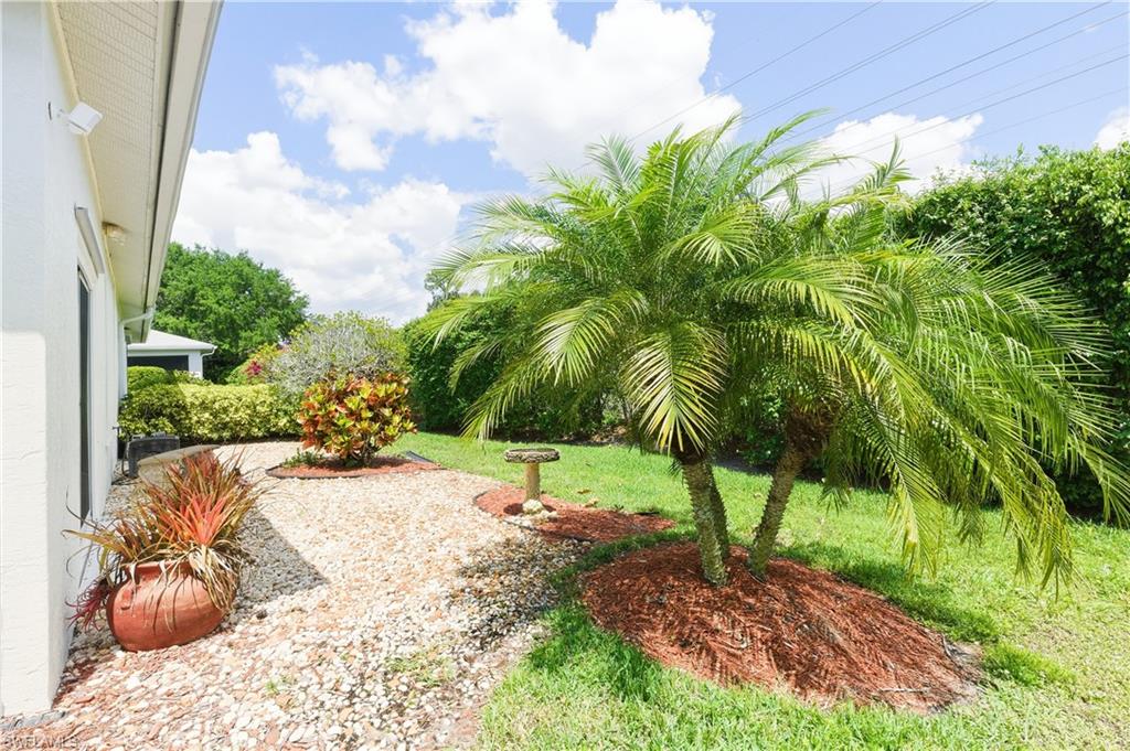 415 Crossfield Circle, Unit 81 Naples, FL 34104 - Photo 17 of 33 a view of a backyard of a house