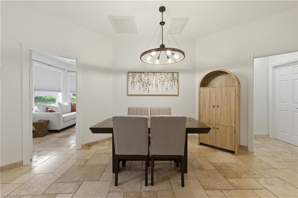 415 Crossfield Circle, Unit 81 Naples, FL 34104 - Photo 24 of 33 a view of a livingroom and dining room
