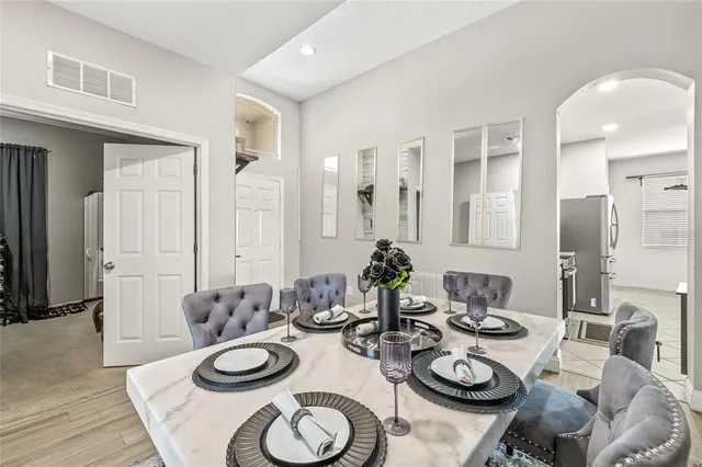 a room with furniture and wooden floors