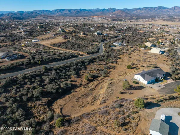 an aerial view of residential house and ocean view