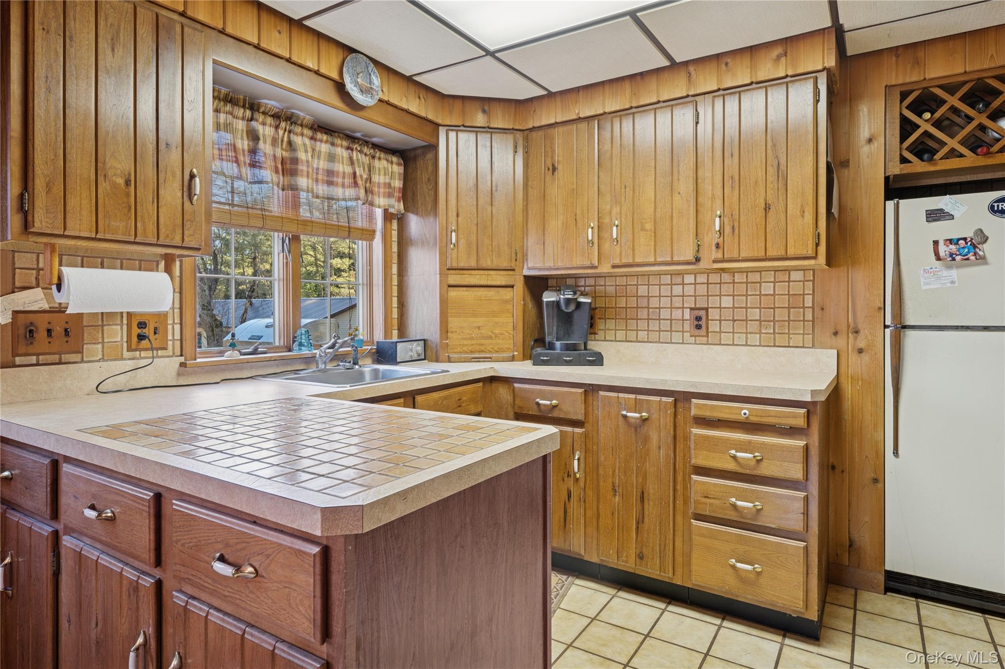 37 Nober Strunk Road Narrowsburg, NY 12764 - Photo 13 of 50 a kitchen with a sink stove and cabinets