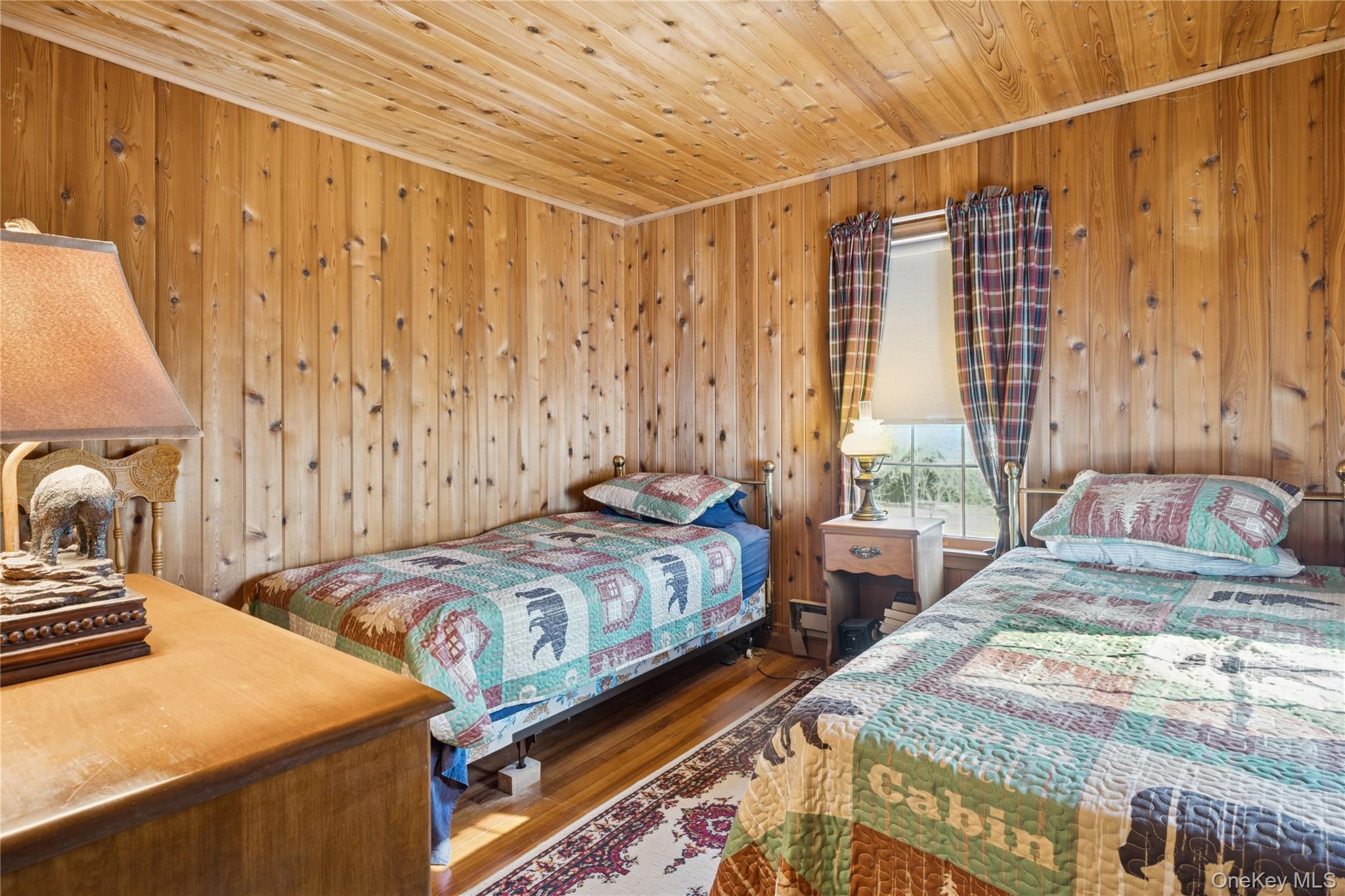 37 Nober Strunk Road Narrowsburg, NY 12764 - Photo 23 of 50 a bedroom with two beds and a dresser