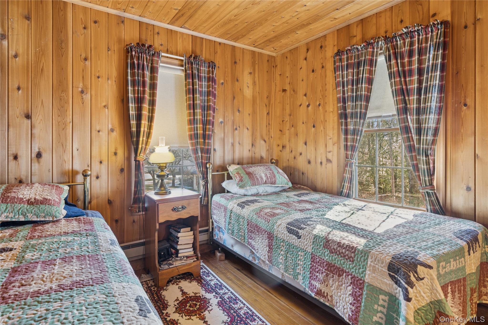 37 Nober Strunk Road Narrowsburg, NY 12764 - Photo 24 of 50 a bedroom with a bed and a window