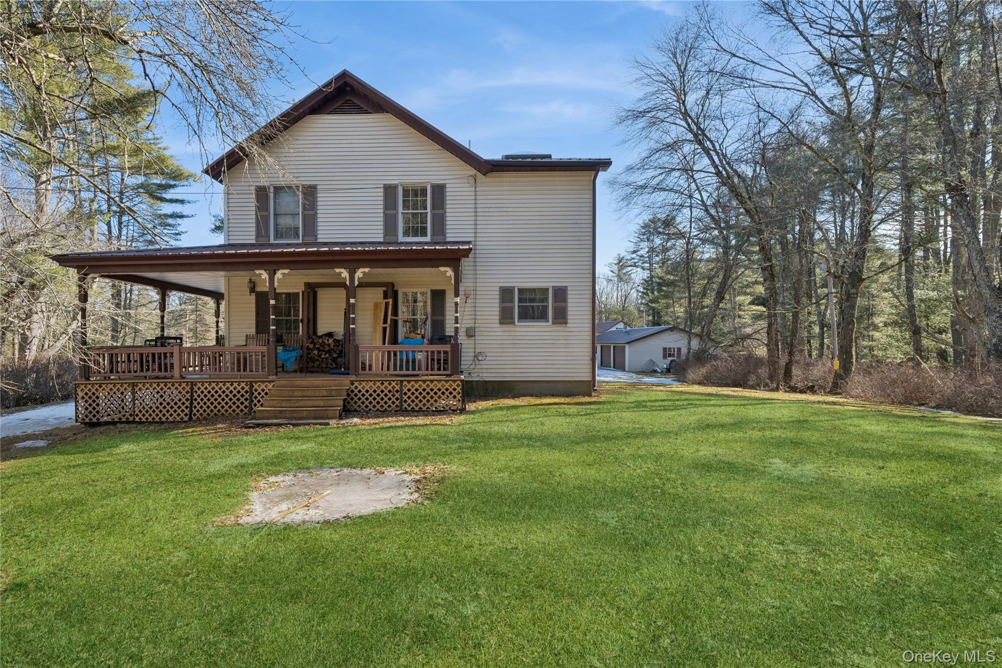 37 Nober Strunk Road Narrowsburg, NY 12764 - Photo 3 of 50 a front view of house with yard and green space