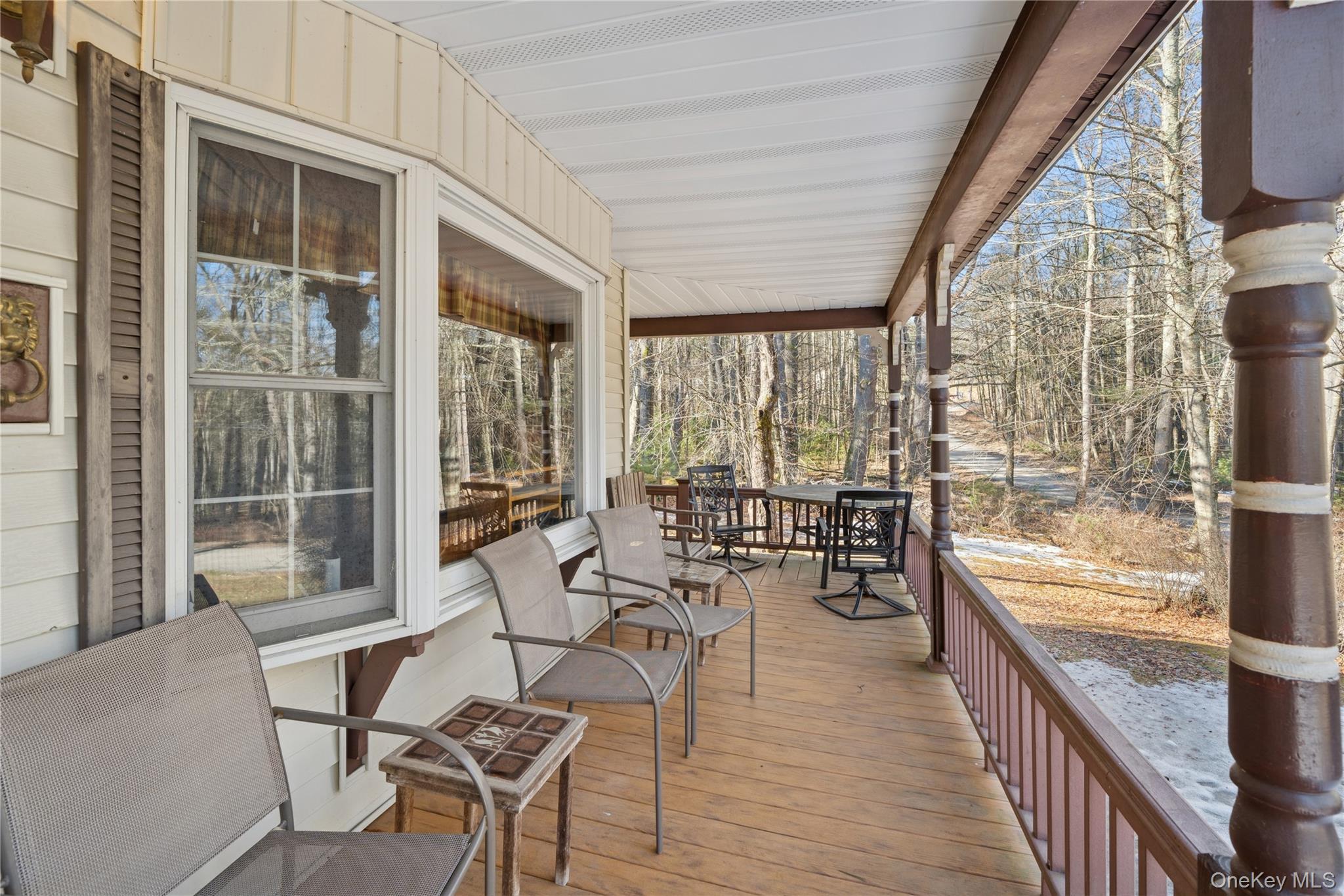 37 Nober Strunk Road Narrowsburg, NY 12764 - Photo 4 of 50 a view of a dining room with furniture window and outside view