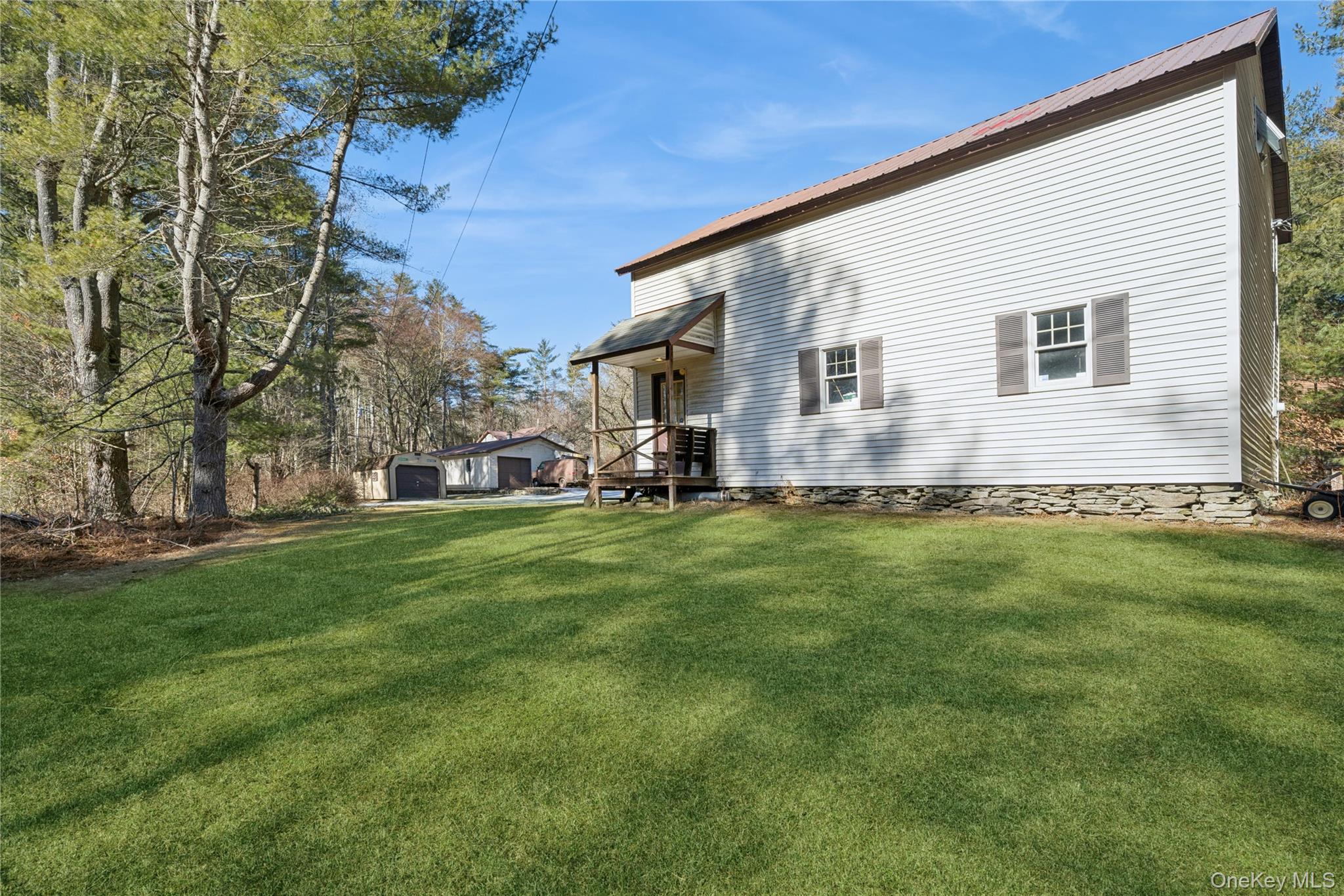 37 Nober Strunk Road Narrowsburg, NY 12764 - Photo 43 of 50 a front view of house with yard and trees