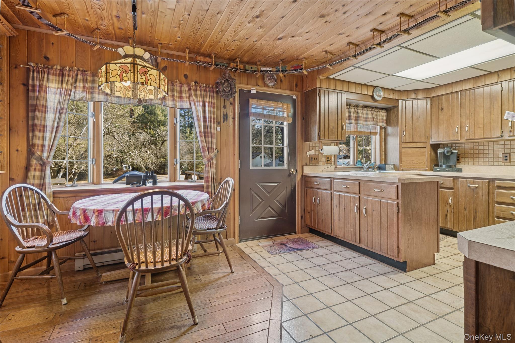 37 Nober Strunk Road Narrowsburg, NY 12764 - Photo 9 of 50 a view of a dining room with furniture window and outside view