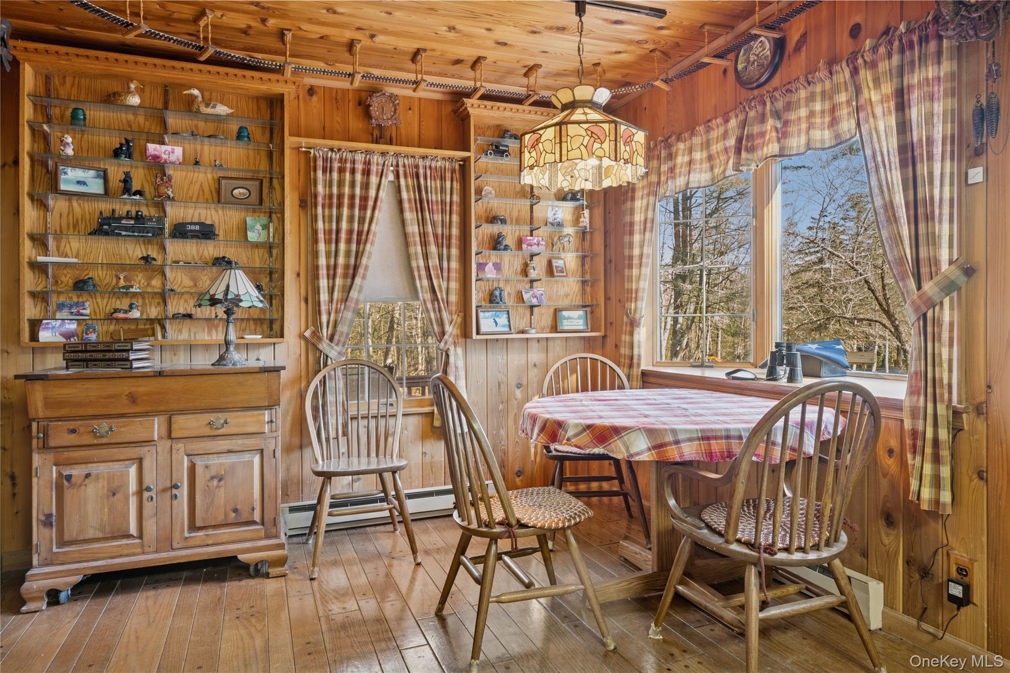 37 Nober Strunk Road Narrowsburg, NY 12764 - Photo 10 of 50 a view of a dining room with furniture and wooden floor