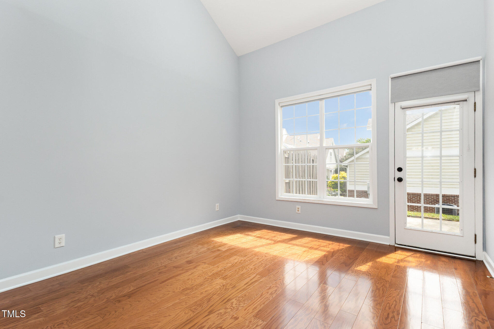 8004 Thrush Ridge Lane Raleigh, NC 27615 - Photo 12 of 34 a view of an empty room with a window