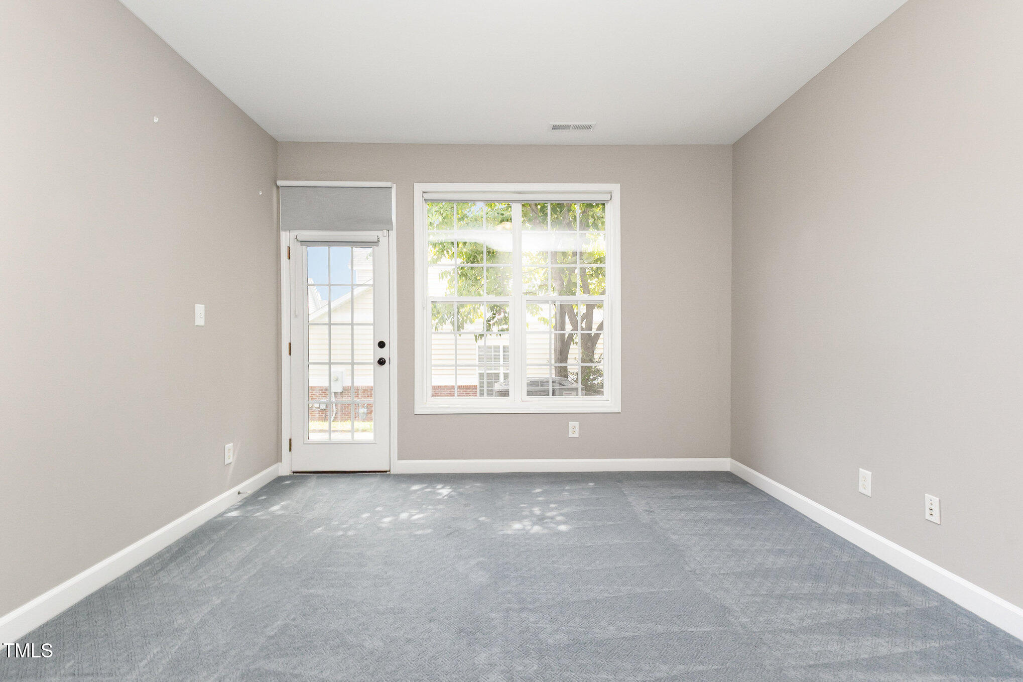 8004 Thrush Ridge Lane Raleigh, NC 27615 - Photo 16 of 34 a view of an empty room with a window