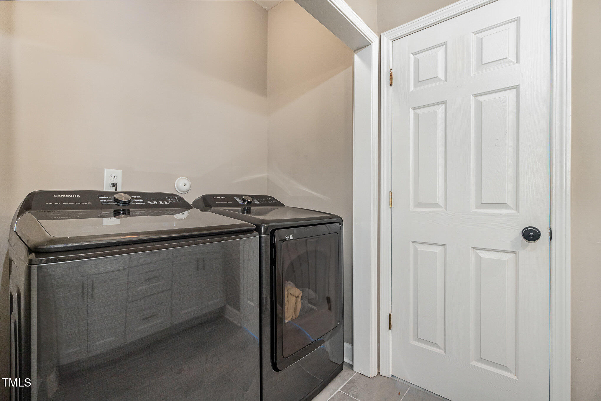 8004 Thrush Ridge Lane Raleigh, NC 27615 - Photo 19 of 34 a utility room with dryer and washer