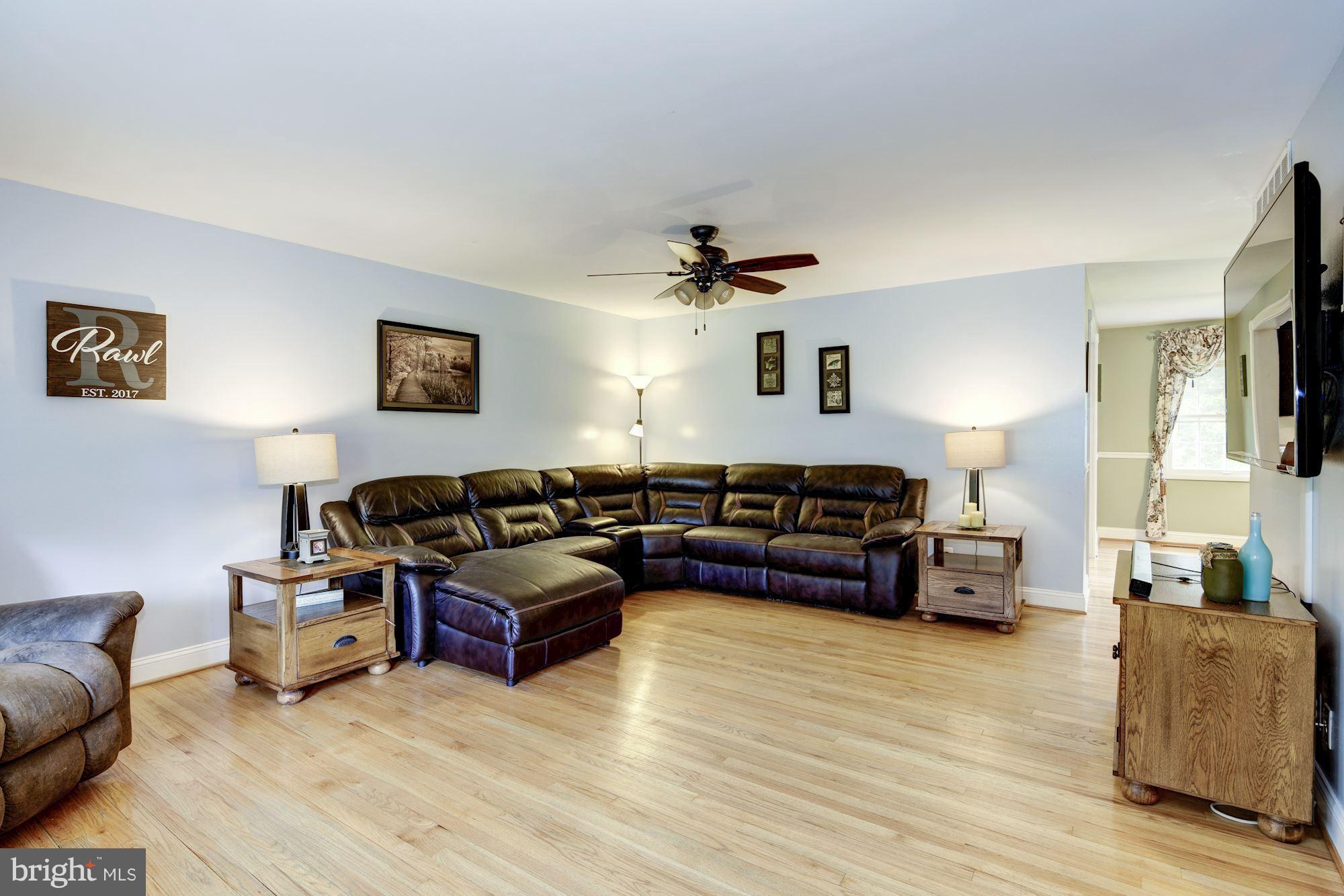 Spacious Family Room with Hardwood Floors