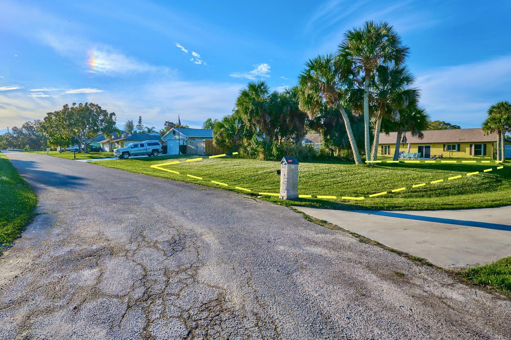 34 Sunset Drive Sebastian, FL 32958 - Photo 14 of 63 a view of a ground with large trees and a big yard