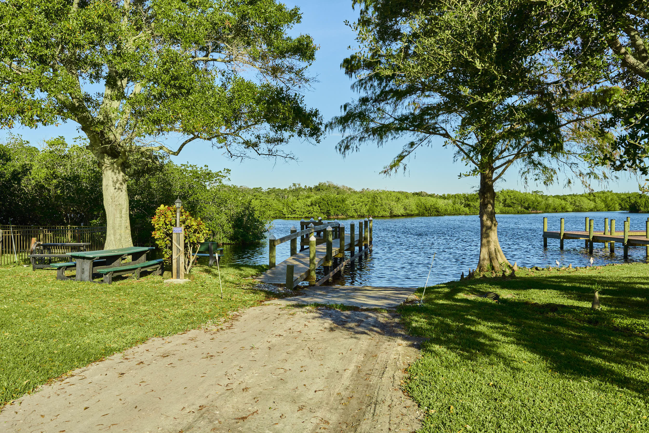 34 Sunset Drive Sebastian, FL 32958 - Photo 20 of 63 a view of a garden with an outdoor space