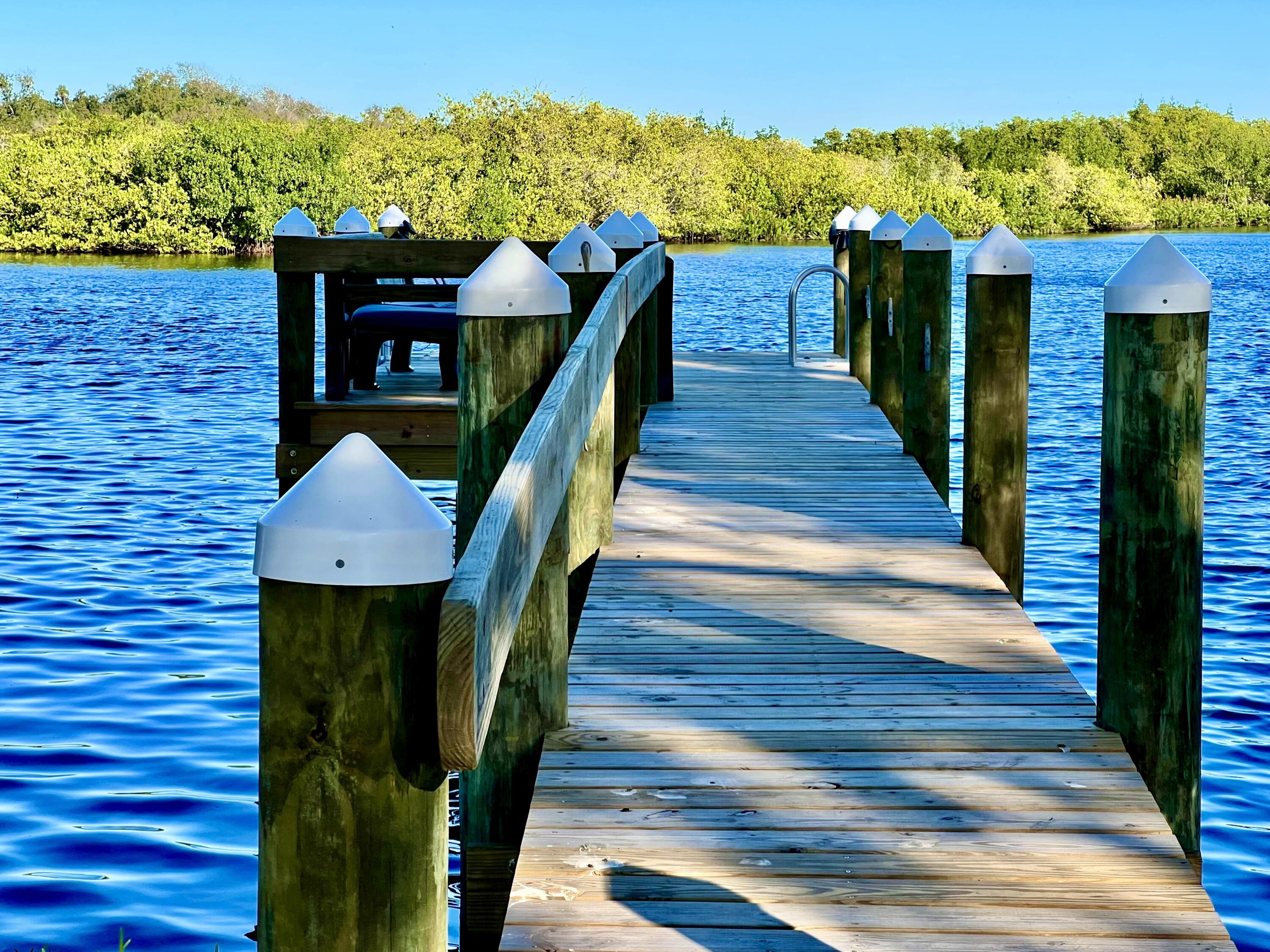 34 Sunset Drive Sebastian, FL 32958 - Photo 24 of 63 a view of a house with a yard