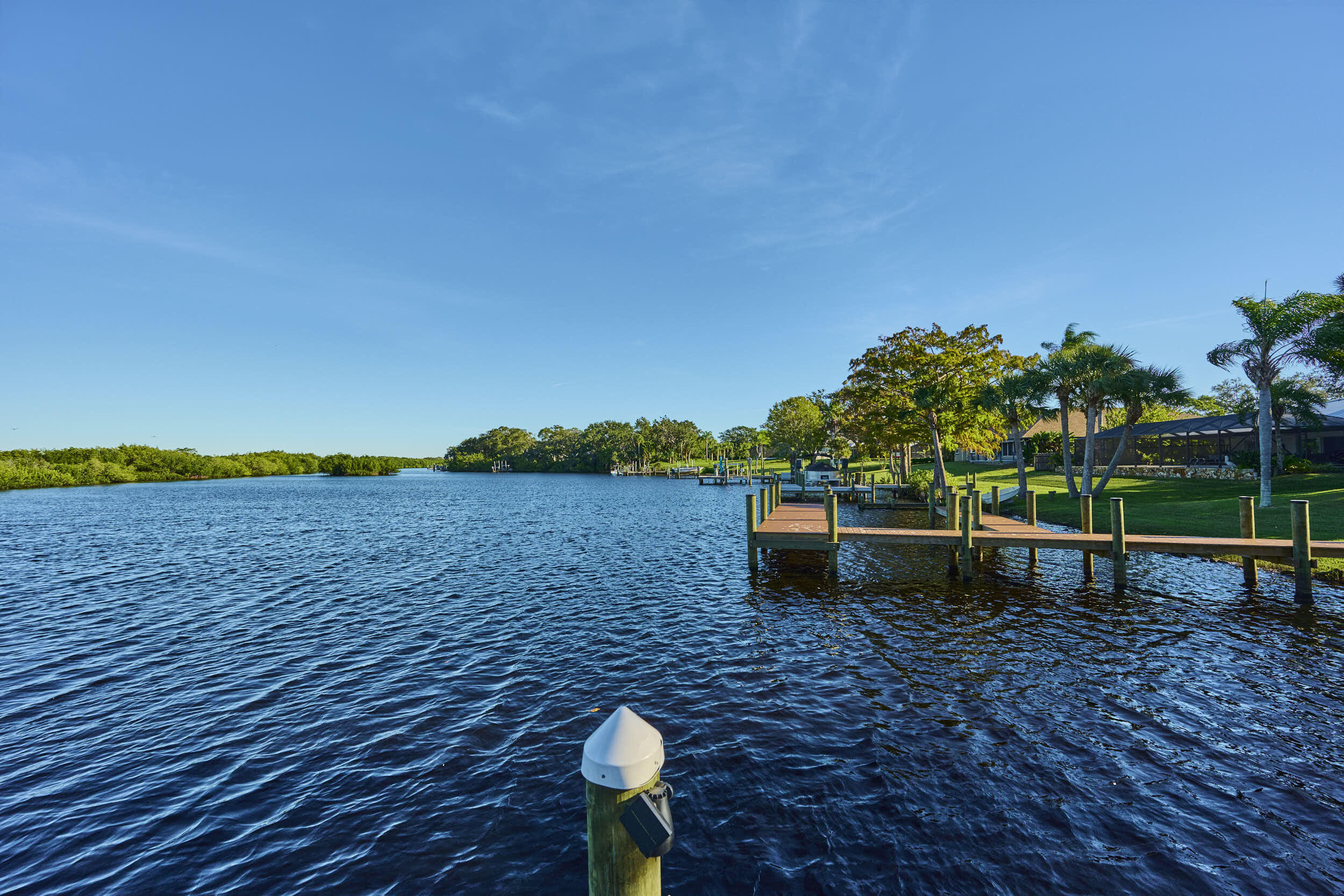 34 Sunset Drive Sebastian, FL 32958 - Photo 27 of 63 a view of a lake with a yard