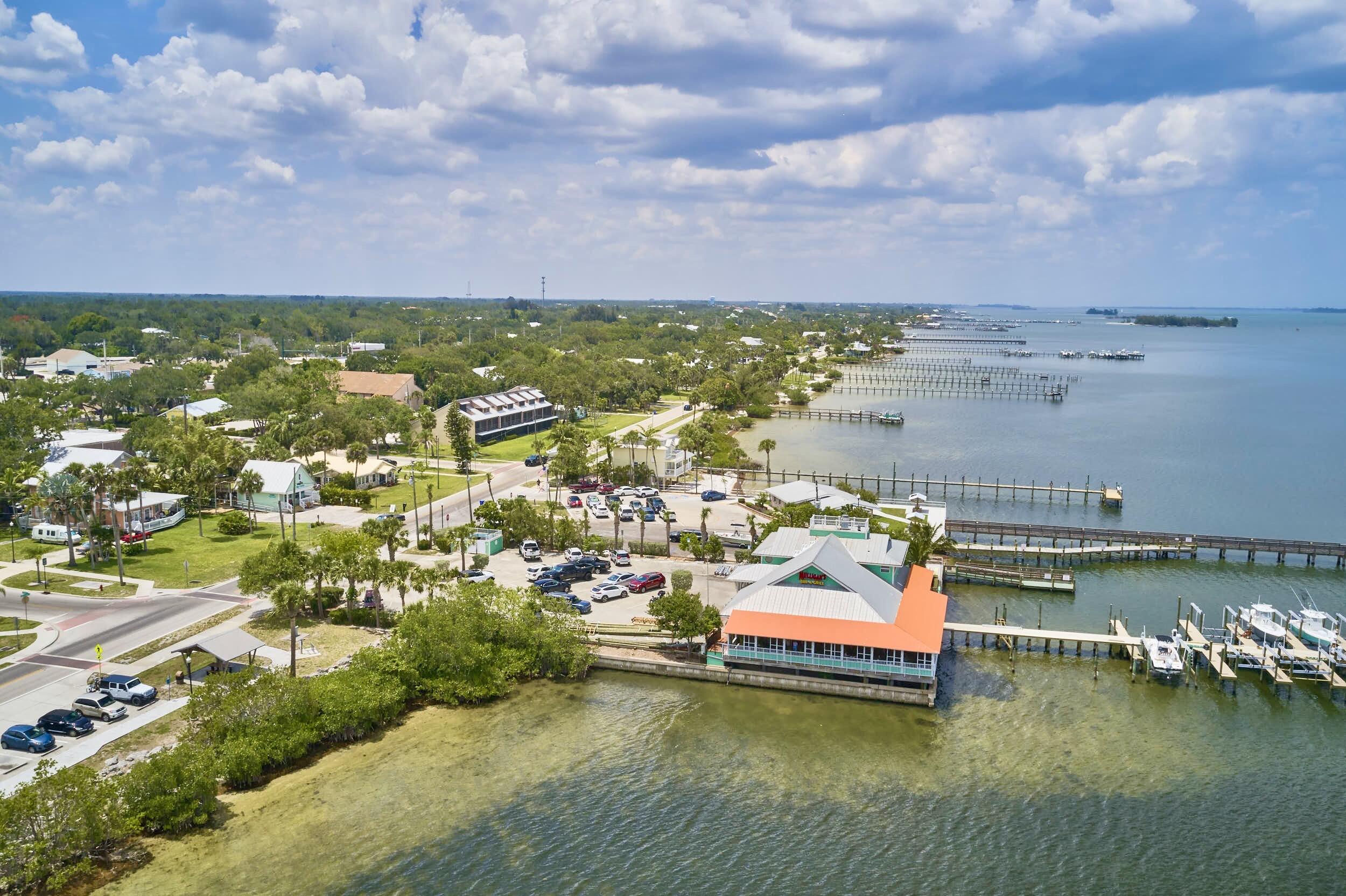 34 Sunset Drive Sebastian, FL 32958 - Photo 37 of 63 a view of a lake with houses