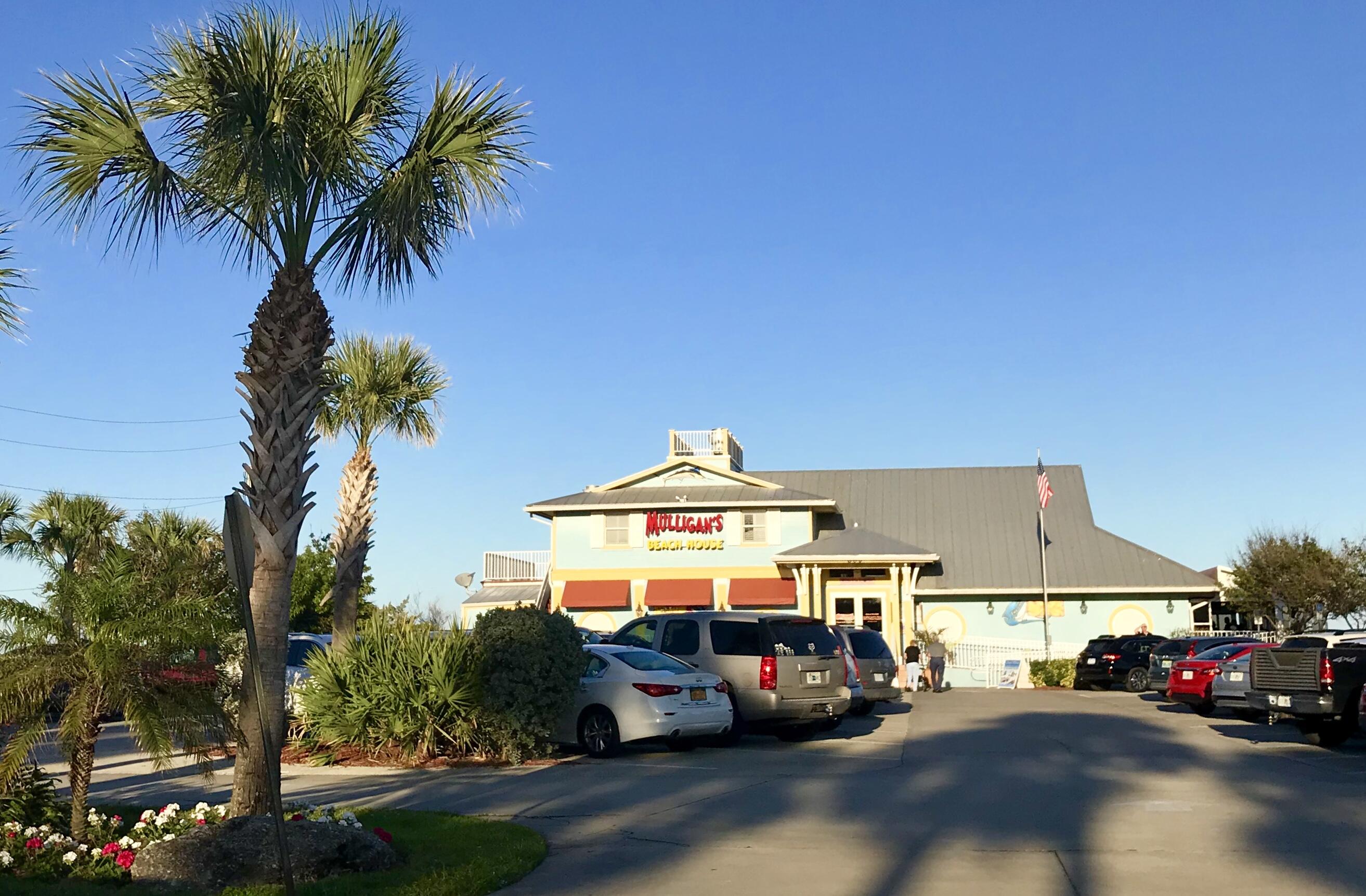34 Sunset Drive Sebastian, FL 32958 - Photo 38 of 63 a front view of a house with a garden
