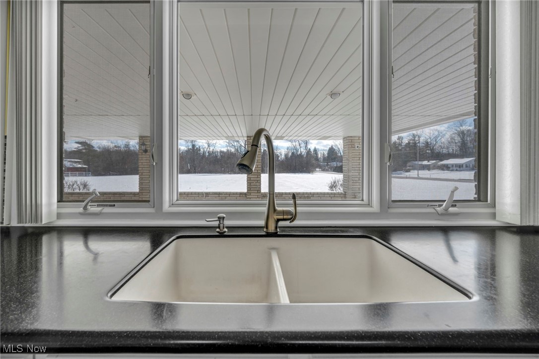 36350 Bainbridge Road Solon, OH 44139 - Photo 13 of 38 kitchen sink looks out to large back patio