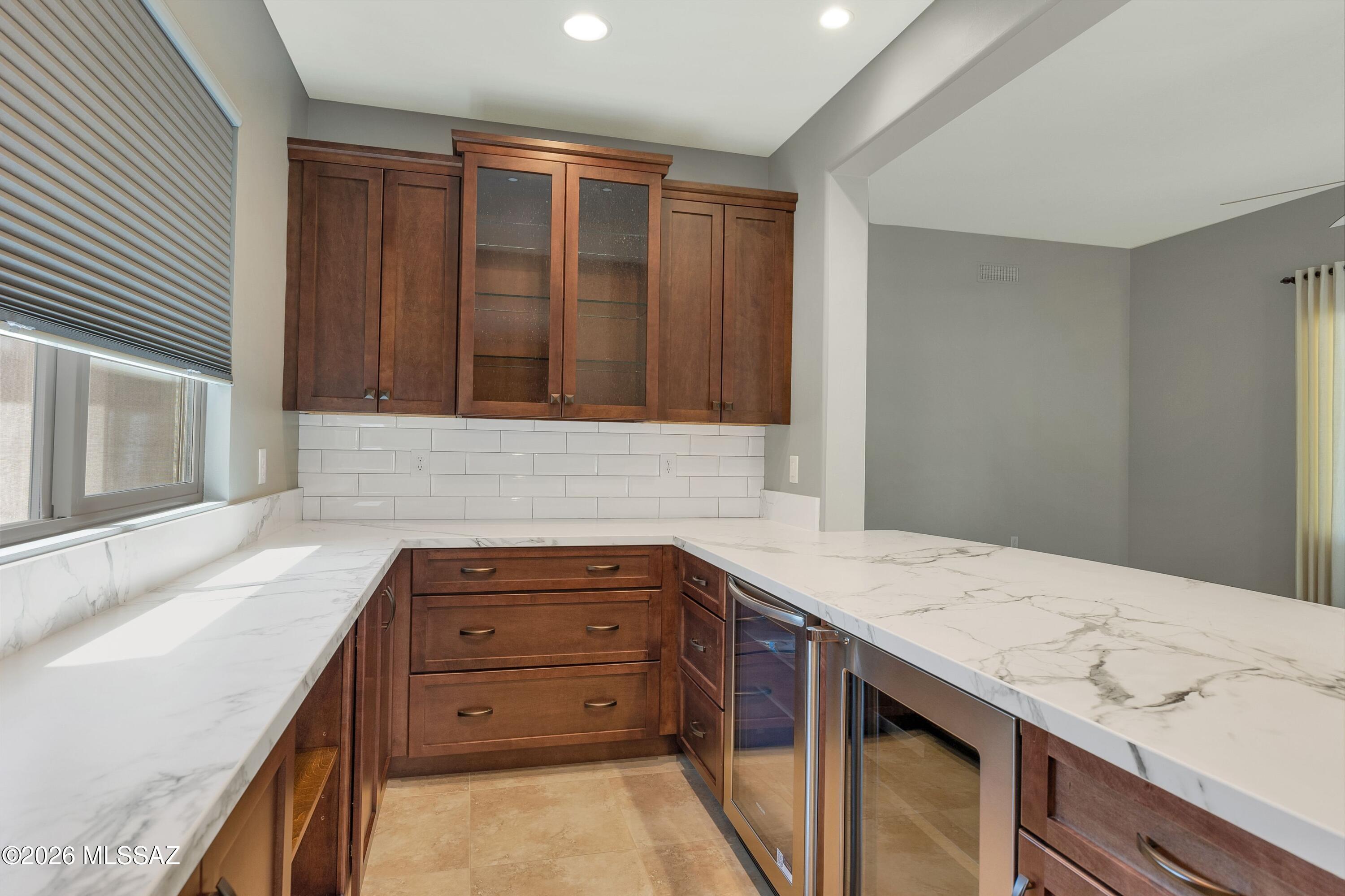 63200 East Flower Ridge Drive Tucson, AZ 85739 - Photo 19 of 50 Bar with wine & beverage refrigerators