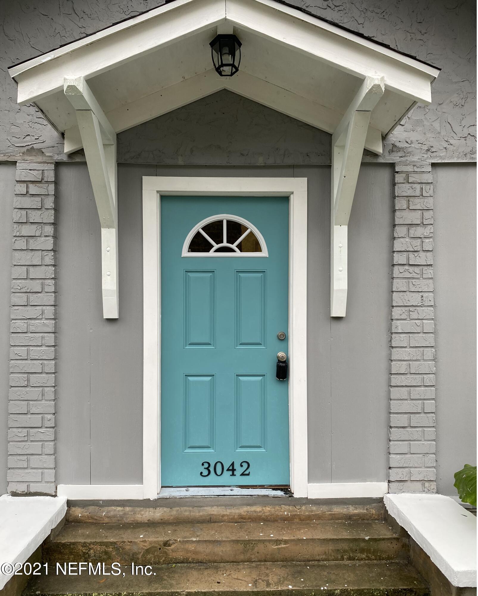 a front view of a house with a door