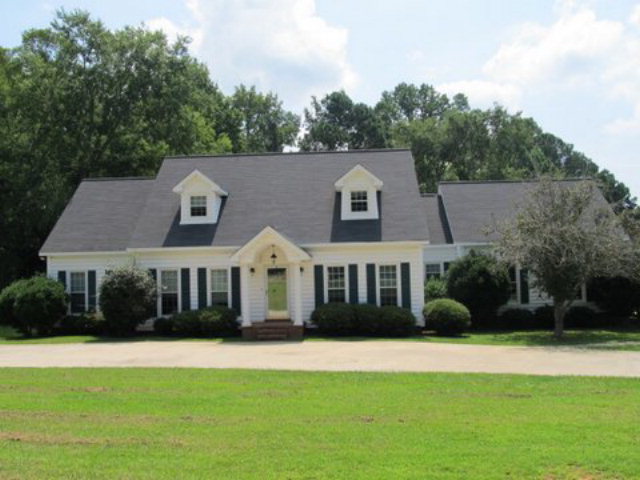 169 Rivoli Ridge Drive Macon, GA 31210 - Photo 1 of 1 a front view of house with yard and green space