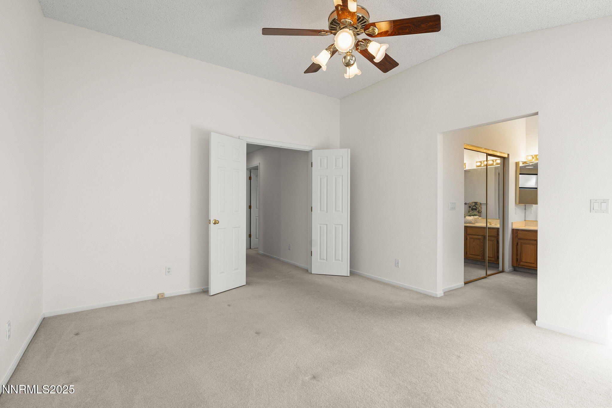 5466 Santa Rosa Avenue Sparks, NV 89436 - Photo 25 of 36 an empty room with chandelier fan