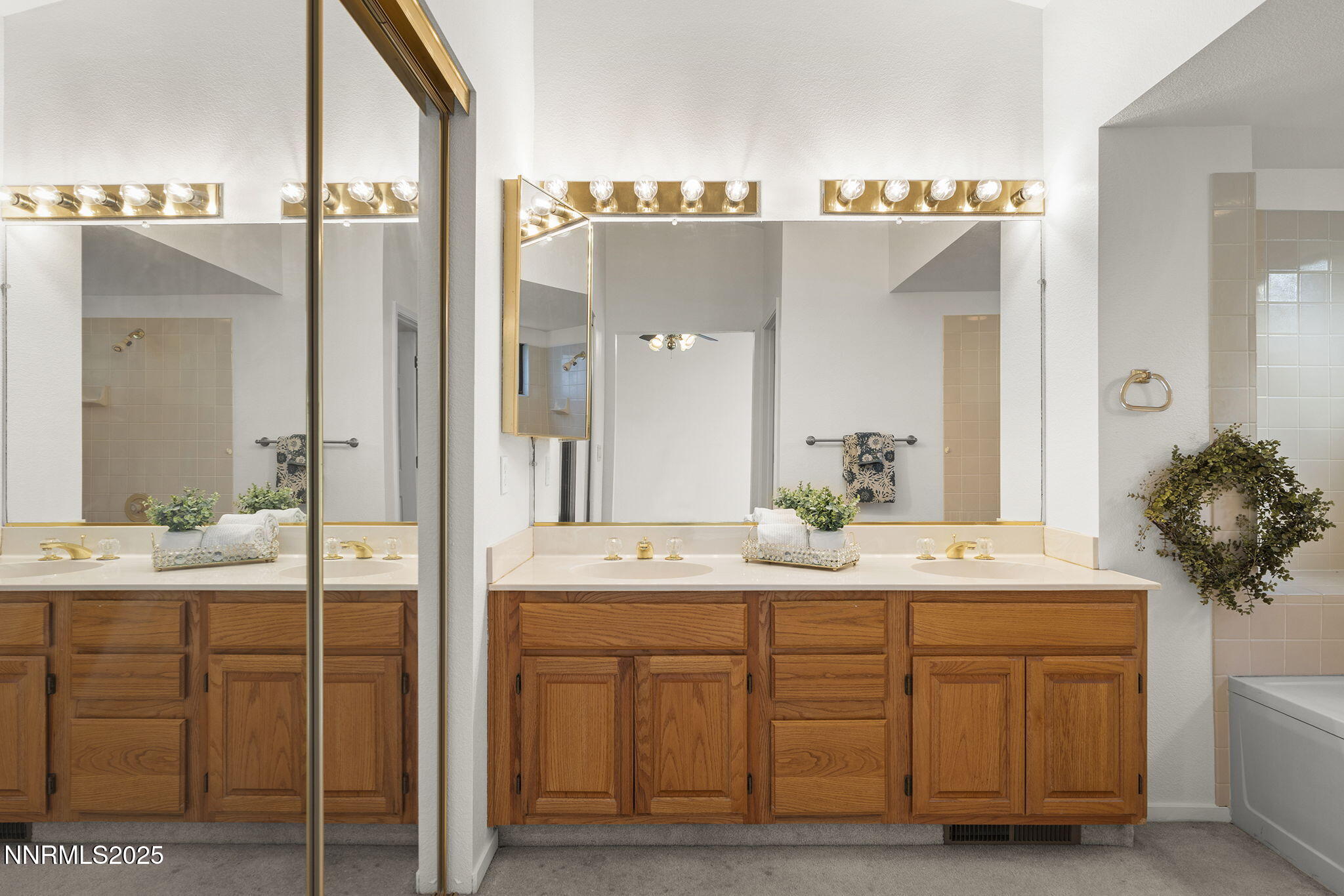 5466 Santa Rosa Avenue Sparks, NV 89436 - Photo 26 of 36 a bathroom with a sink and a mirror