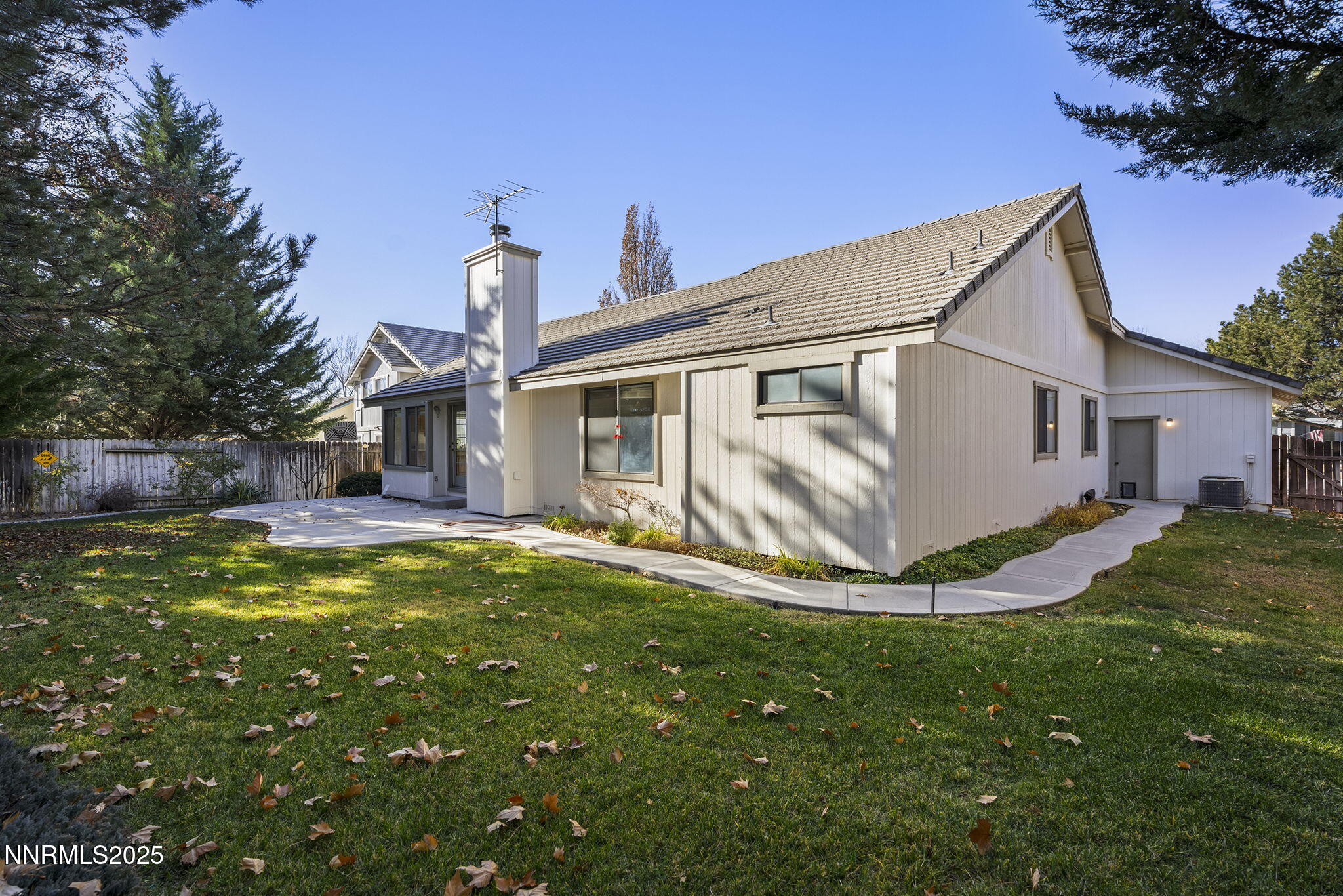 5466 Santa Rosa Avenue Sparks, NV 89436 - Photo 3 of 36 a view of a house with a yard