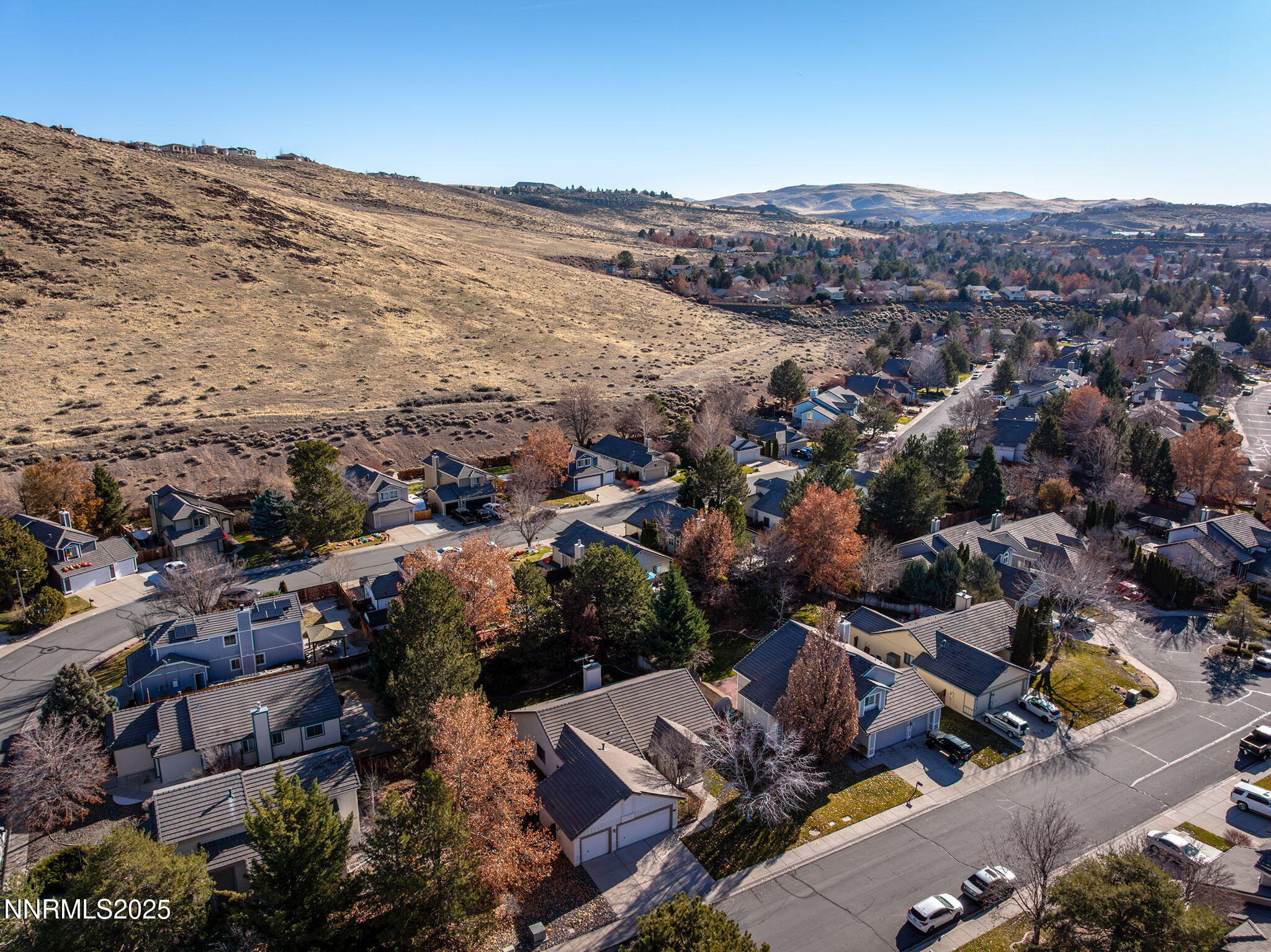 5466 Santa Rosa Avenue Sparks, NV 89436 - Photo 35 of 36 an aerial view of residential house and sandy dunes